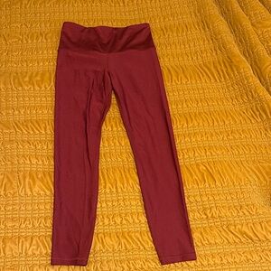 Shiny red leggings